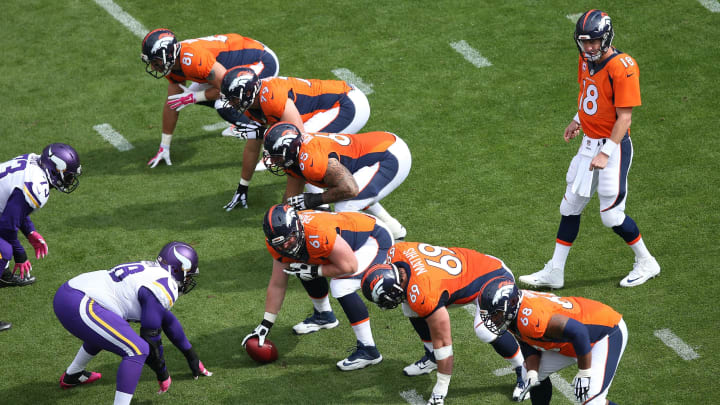 DENVER, CO – OCTOBER 04: Quarterback Peyton Manning #18 of the Denver Broncos runs the offense against the Minnesota Vikings at Sports Authority Field at Mile High on October 4, 2015 in Denver, Colorado. The Broncos defeated the Vikings 23-20. (Photo by Doug Pensinger/Getty Images)