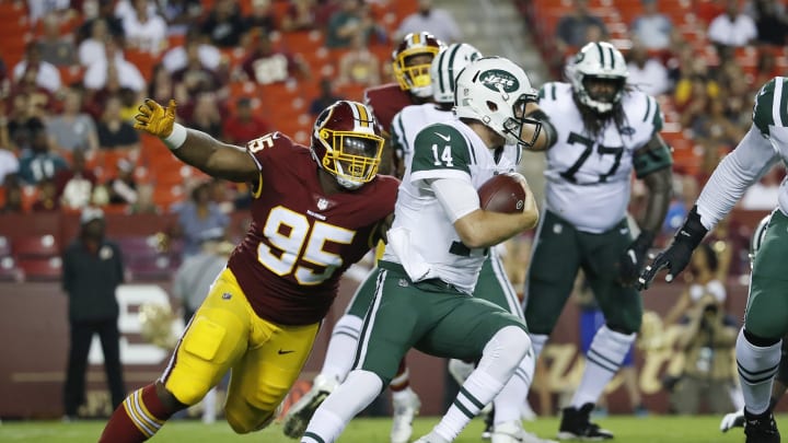 LANDOVER, MD – AUGUST 16: Defensive tackle Da’Ron Payne #95 of the Washington Redskins sacks quarterback Sam Darnold #14 of the New York Jets in the first quarter of a preseason game at FedExField on August 16, 2018, in Landover, Maryland. (Photo by Patrick McDermott/Getty Images)