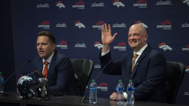 Jan 28, 2022; Englewood, CO, USA; Denver Broncos head coach Nathaniel Hackett waves to the family of Broncos GM George Paton during at a press conference at UC Health Training Center. Hackett becomes the18th head coach in franchise history. Mandatory Credit: John Leyba-USA TODAY Sports