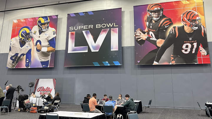 Feb 7, 2022; Los Angeles, CA, USA; Signage with the likeness of Los Angeles Rams players Matthew Stafford and Von Miller with Cincinnatti Bengals players Joe Burrow and Trey Hendrickson displayed at the Super Bowl LVI media center at Los Angeles Convention Center. Mandatory Credit: Gary A. Vasquez-USA TODAY Sports