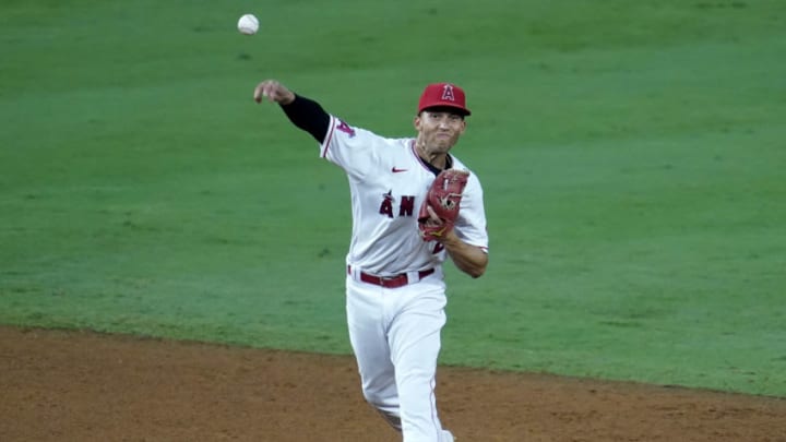 Andrelton Simmons of the Los Angeles Angels makes a throw to first base while playing the Arizona Diamondbacks. (Photo by John McCoy/Getty Images)