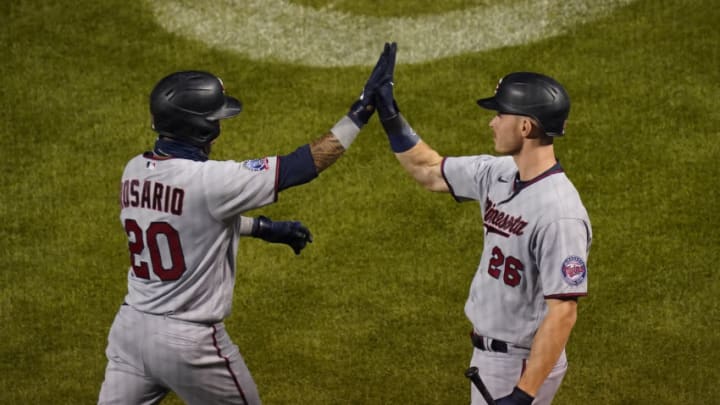 Eddie Rosario of the Minnesota Twins is congratulated by Max Kepler following his home run during the first inning. (Photo by Nuccio DiNuzzo/Getty Images)