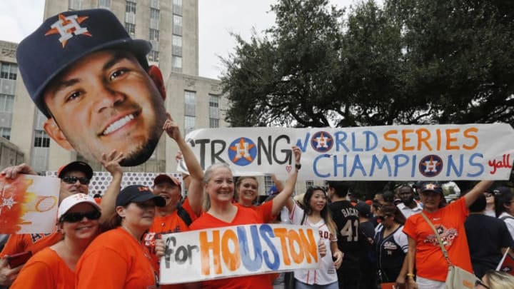 HOUSTON, TX - NOVEMBER 03: Houston Astros fans celebrate before the Houston Astros Victory Parade on November 3, 2017 in Houston, Texas. The Astros defeated the Los Angeles Dodgers 5-1 in Game 7 to win the 2017 World Series. (Photo by Tim Warner/Getty Images)