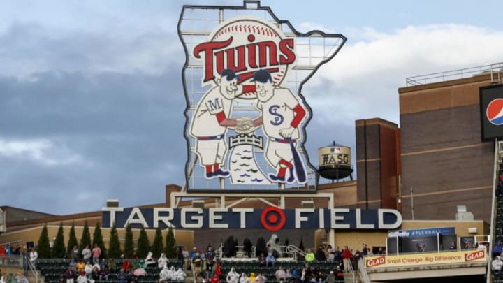 The Target Field sign stands in front of a water tower with the All-Star Game logo on it. (Photo by Bruce Kluckhohn/Minnesota Twins/Getty Images)