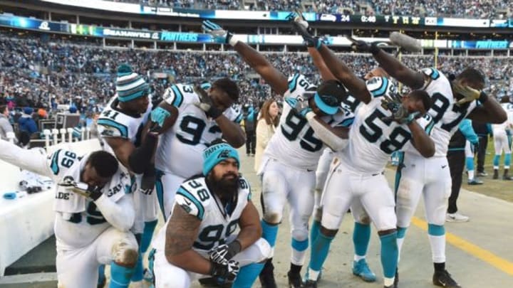 Jan 17, 2016; Charlotte, NC, USA; Carolina Panthers defensive unit does the dab on the sideline after defeating the Seattle Seahawks 31-24 in the NFC Divisional round playoff game at Bank of America Stadium. Mandatory Credit: Sam Sharpe-USA TODAY Sports