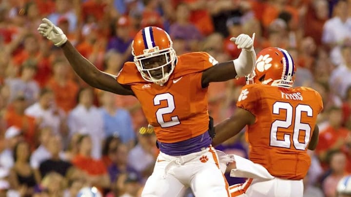 Sep 27, 2014; Clemson, SC, USA; Clemson Tigers cornerback MacKensie Alexander (2) and cornerback Garry Peters (26) celebrate after breaking up a pass during the first quarter against the North Carolina Tar Heels at Clemson Memorial Stadium. Mandatory Credit: Joshua S. Kelly-USA TODAY Sports