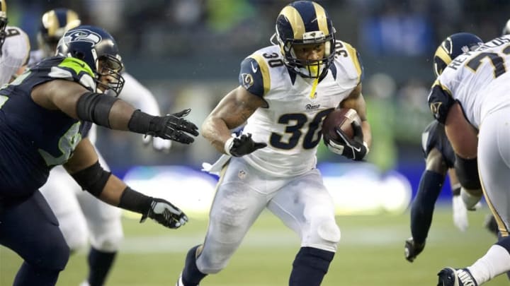 Dec 27, 2015; Seattle, WA, USA; St. Louis Rams running back Todd Gurley (30) picks up a first down against the Seattle Seahawks at CenturyLink Field. The Rams won 23-17. Mandatory Credit: Troy Wayrynen-USA TODAY Sports