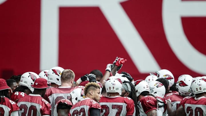 July 31, 2016; Glendale, AZ, USA; Arizona Cardinals team huddle during training camp at University of Phoenix Stadium. Mandatory Credit: Charlie Kaijo/The Arizona Republic via USA TODAY NETWORK