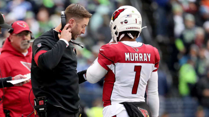 SEATTLE, WASHINGTON - DECEMBER 22: Head coach Kliff Kingsbury of the Arizona Cardinals and quarterback Kyler Murray #1 talk on the sidelines during the game against the Seattle Seahawks at CenturyLink Field on December 22, 2019 in Seattle, Washington. (Photo by Abbie Parr/Getty Images)