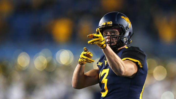 MORGANTOWN, WV – OCTOBER 25: David Sills V #13 of the West Virginia Mountaineers reacts after a first down in the first half against the Baylor Bears at Mountaineer Field on October 25, 2018 in Morgantown, West Virginia. (Photo by Justin K. Aller/Getty Images)