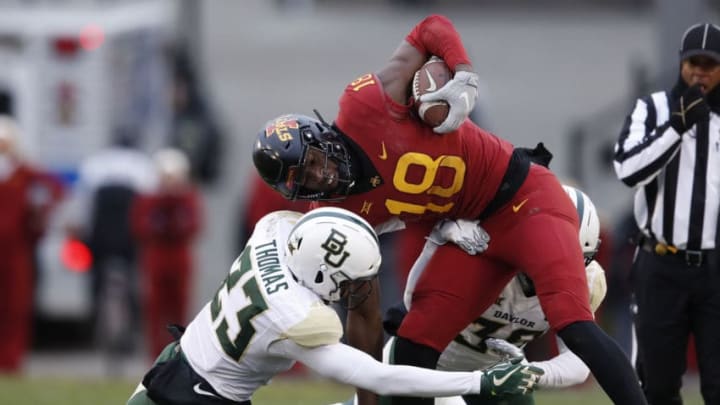 AMES, IA - NOVEMBER 10: Cornerback Derrek Thomas #23, and linebacker Allen Anderson #36 of the Baylor Bears, tackle wide receiver Hakeem Butler #18 of the Iowa State Cyclones as he rushed for yards in the first half of play at Jack Trice Stadium on November 10, 2018 in Ames, Iowa. (Photo by David Purdy/Getty Images) AMES, IA - NOVEMBER 10: Cornerback Derrek Thomas #23, and linebacker Allen Anderson #36 of the Baylor Bears, tackle wide receiver Hakeem Butler #18 of the Iowa State Cyclones as he rushed for yards in the first half of play at Jack Trice Stadium on November 10, 2018 in Ames, Iowa. (Photo by David Purdy/Getty Images)