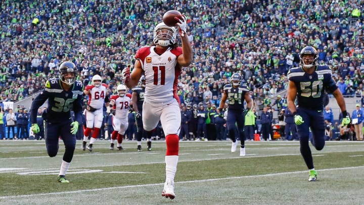 SEATTLE, WA – DECEMBER 30: Larry Fitzgerald #11 of the Arizona Cardinals catches the ball for a touchdown in the second quarter against the Seattle Seahawks at CenturyLink Field on December 30, 2018 in Seattle, Washington. (Photo by Otto Greule Jr/Getty Images)