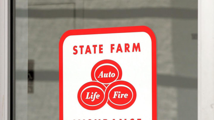 PALATINE, IL - AUGUST 30: State Farm Insurance signage is seen on a door of an auto claim center August 30, 2005 in Palatine, Illinois. Damage from Hurricane Katrina may destroy previous records regarding insurance claims, possibly reaching $26 billion, impacting insurers such as Allstate and State Farm. (Photo by Tim Boyle/Getty Images)