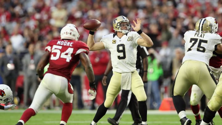 GLENDALE, AZ – DECEMBER 18: Quarterback Drew Brees #9 of the New Orleans Saints makes a pass against the Arizona Cardinals in the fourth quarter of the NFL game at the University of Phoenix Stadium on December 18, 2016 in Glendale, Arizona. The Saints defeated the Cardinals 48-41. (Photo by Christian Petersen/Getty Images)