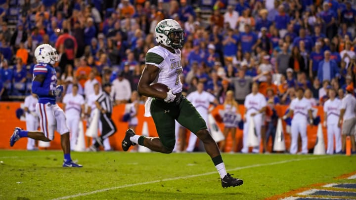 GAINESVILLE, FL – NOVEMBER 18: Xavier Ubosi #7 of the UAB Blazers scores a touchdown during the second half of the game against the Florida Gators at Ben Hill Griffin Stadium on November 18, 2017 in Gainesville, Florida. (Photo by Rob Foldy/Getty Images)