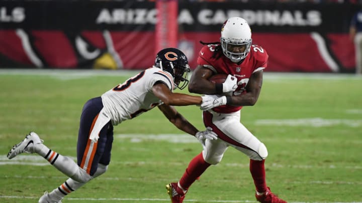 GLENDALE, AZ - AUGUST 19: Chris Johnson #23 of the Arizona Cardinals runs with the ball as Kyle Fuller #23 of the Chicago Bears attempts to make a tackle from behind during the first half at University of Phoenix Stadium on August 19, 2017 in Glendale, Arizona. Bears won 24-23. (Photo by Norm Hall/Getty Images)