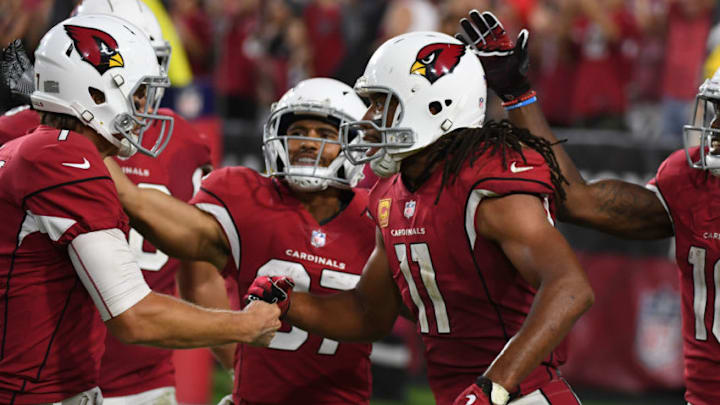 GLENDALE, AZ - NOVEMBER 26: Blaine Gabbert #7 of the Arizona Cardinals is congratulated by Larry Fitzgerald #11 after throwing a touchdown pass in the second half against the Jacksonville Jaguars at University of Phoenix Stadium on November 26, 2017 in Glendale, Arizona. (Photo by Norm Hall/Getty Images)