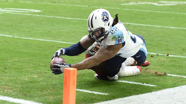 GLENDALE, AZ - DECEMBER 10: Derrick Henry #22 of the Tennessee Titans rushes the football for a six yard touchdown against the Arizona Cardinals in the first half at University of Phoenix Stadium on December 10, 2017 in Glendale, Arizona. (Photo by Norm Hall/Getty Images)