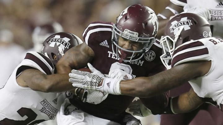 COLLEGE STATION, TX - OCTOBER 03: Christian Kirk COLLEGE STATION, TX - OCTOBER 03: Christian Kirk #3 of the Texas A&M Aggies is tackled by Brandon Bryant #20 of the Mississippi State Bulldogs in the second half on October 3, 2015 at Kyle Field in College Station, Texas. Aggies won 30 to 17. (Photo by Thomas B. Shea/Getty Images)