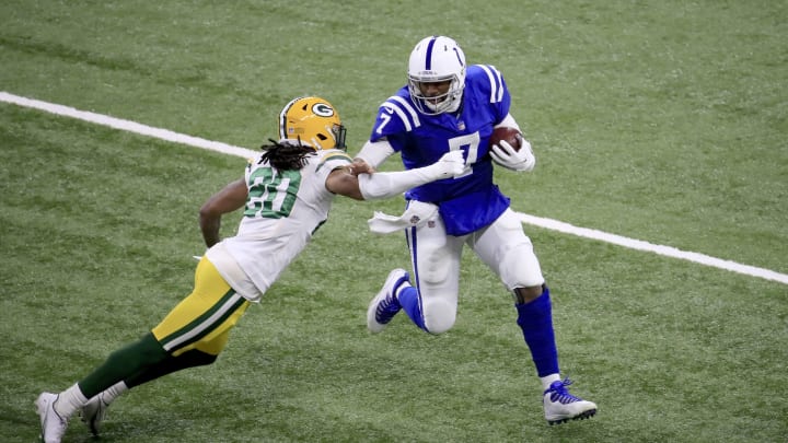 INDIANAPOLIS, INDIANA – NOVEMBER 22: Jacoby Brissett #7 of the Indianapolis Colts runs with the ball against the Green Bay Packers during the third quarter in the game at Lucas Oil Stadium on November 22, 2020 in Indianapolis, Indiana. (Photo by Andy Lyons/Getty Images)