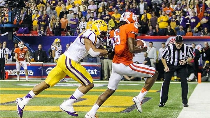 Dec 31, 2012; Atlanta, GA, USA; Clemson Tigers wide receiver DeAndre Hopkins (6) catches a touchdown pass over LSU Tigers safety Eric Reid (1) in the second half in the 2012 Chick-fil-A Bowl at the Georgia Dome. Clemson won 25-24. Mandatory Credit: Daniel Shirey-USA TODAY Sports