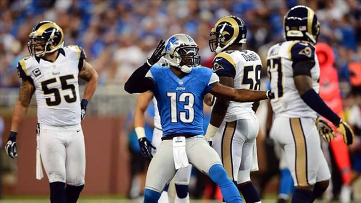 Sep 9, 2012; Detroit, MI, USA; Detroit Lions wide receiver Nate Burleson (13) celebrates a first down in the third quarter against the St. Louis Rams at Ford Field. Mandatory Credit: Andrew Weber-US Presswire