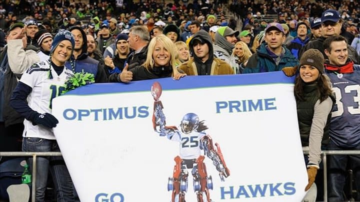 Dec 9, 2012; Seattle, WA, USA; Seattle Seahawks hold up a Seattle Seahawks cornerback Richard Sherman (25) (not pictured) sign during the 2nd half between the Seattle Seahawks and the Arizona Cardinals at CenturyLink Field. Mandatory Credit: Steven Bisig-USA TODAY Sports