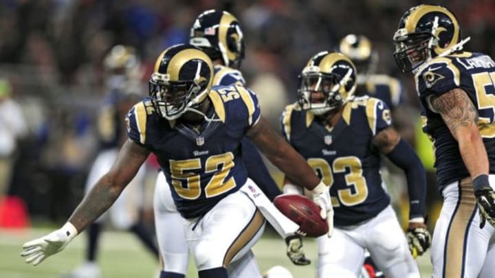 Nov 16, 2014; St. Louis, MO, USA; St. Louis Rams outside linebacker Alec Ogletree (52) celebrates after intercepting a pass from Denver Broncos quarterback Peyton Manning (not pictured) during the second half at the Edward Jones Dome. The Rams won 22-7. Mandatory Credit: Jeff Curry-USA TODAY Sports