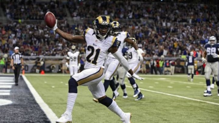 Sep 21, 2014; St. Louis, MO, USA; St. Louis Rams cornerback Janoris Jenkins (21) celebrates as he runs back an intercepted pass for a touchdown during the first half against the Dallas Cowboys at the Edward Jones Dome. Mandatory Credit: Jeff Curry-USA TODAY Sports