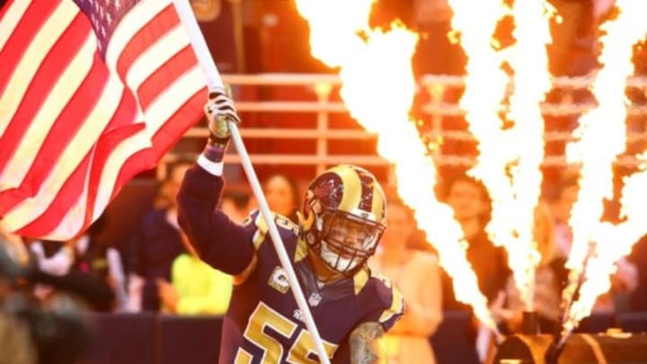 Nov 15, 2015; St. Louis, MO, USA; St. Louis Rams middle linebacker James Laurinaitis (55) is introduced to the crowd prior to the start of a game between the St. Louis Rams and the Chicago Bears at the Edward Jones Dome. Mandatory Credit: Billy Hurst-USA TODAY Sports