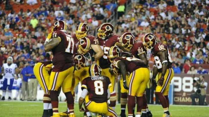 Aug 26, 2016; Landover, MD, USA; Washington Redskins quarterback Kirk Cousins (8) and Washington Redskins huddle against the Buffalo Bills during the first half at FedEx Field. Mandatory Credit: Brad Mills-USA TODAY Sports