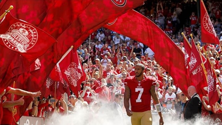 Sep 22, 2013; San Francisco, CA, USA; San Francisco 49ers quarterback Colin Kaepernick (7) walks onto the field during player introductions before the start of the game against the Indianapolis Colts at Candlestick Park. Mandatory Credit: Cary Edmondson-USA TODAY Sports