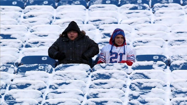 Dec. 30, 2012; Orchard Park, NY, USA; Fans sit in the snow covered seats before a game between the Buffalo Bills and the New York Jets at Ralph Wilson Stadium. Mandatory Credit: Timothy T. Ludwig-USA TODAY Sports