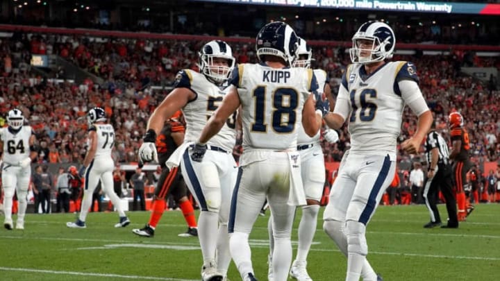 CLEVELAND, OH - SEPTEMBER 22: Cooper Kupp #18 of the Los Angeles Rams is congratulated by Jared Goff #16 after scoring a touchdown during the third quarter of the game agains the Cleveland Browns at FirstEnergy Stadium on September 22, 2019 in Cleveland, Ohio. Los Angeles defeated Cleveland 20-13. (Photo by Kirk Irwin/Getty Images)