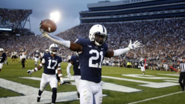 STATE COLLEGE, PA – SEPTEMBER 01: Amani Oruwariye #21 of the Penn State Nittany Lions celebrates after intercepting a pass in overtime to clinch the win against the Appalachian State Mountaineers on September 1, 2018 at Beaver Stadium in State College, Pennsylvania. (Photo by Justin K. Aller/Getty Images)