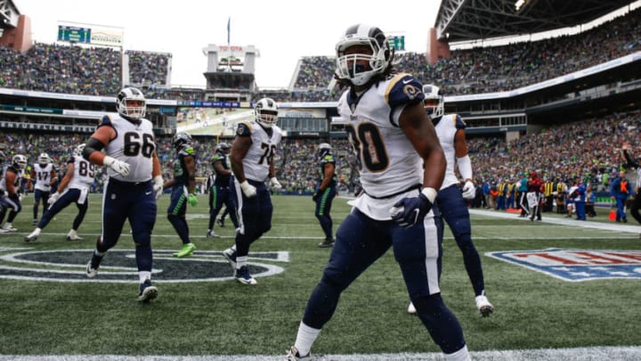 SEATTLE, WA - OCTOBER 07: Running Back Todd Gurley III #30 of the Los Angeles Rams celebrates a touchdown during the second half against the Seattle Seahawks at CenturyLink Field on October 7, 2018 in Seattle, Washington. (Photo by Otto Greule Jr/Getty Images)