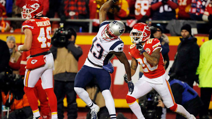 KANSAS CITY, MISSOURI - JANUARY 20: Phillip Dorsett #13 of the New England Patriots celebrates catching a 29 yard touchdown in the second quarter against Steven Nelson #20 of the Kansas City Chiefs during the AFC Championship Game at Arrowhead Stadium on January 20, 2019 in Kansas City, Missouri. (Photo by David Eulitt/Getty Images)