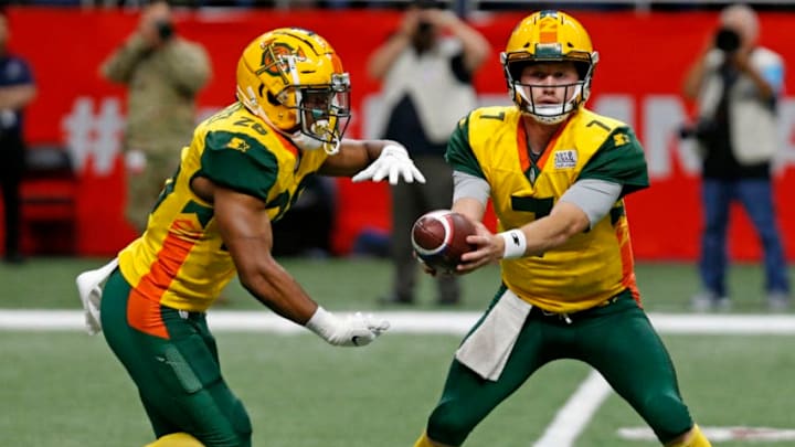 SAN ANTONIO, TX - MARCH 31: Jhurell Pressley #26 of the Arizona Hotshot takes the handoff from John Wolford #7 during an Alliance of American Football game against the San Antonio Commanders at the Alamodome on March 31, 2019 in San Antonio, Texas. (Photo by Edward A. Ornelas/Getty Images) SAN ANTONIO, TX - MARCH 31: Jhurell Pressley #26 of the Arizona Hotshot takes the handoff from John Wolford #7 during an Alliance of American Football game against the San Antonio Commanders at the Alamodome on March 31, 2019 in San Antonio, Texas. (Photo by Edward A. Ornelas/Getty Images)