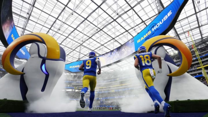 Oct 16, 2022; Inglewood, California, USA; Los Angeles Rams quarterback Matthew Stafford (9) and wide receiver Ben Skowronek (18) enter the field before the game against the Carolina Panthers at SoFi Stadium. Mandatory Credit: Kirby Lee-USA TODAY Sports