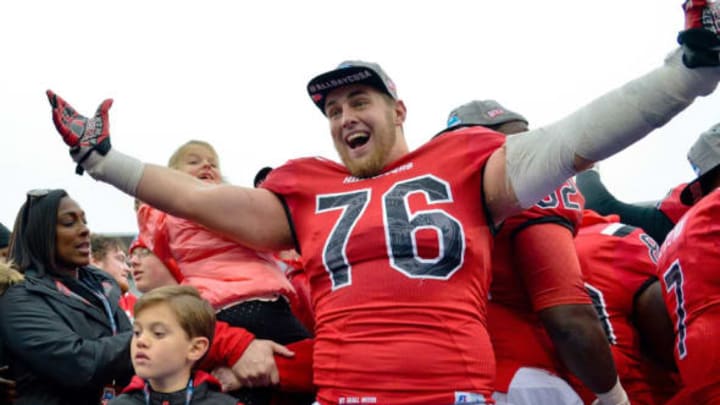 Dec 3, 2016; Bowling Green, KY, USA; Western Kentucky Hilltoppers offensive lineman Forrest Lamp (76) celebrates his teams victory following the CUSA championship game against the Louisiana Tech Bulldogs at Houchens Industries-L.T. Smith Stadium. Western Kentucky won 58-44. Mandatory Credit: Jim Brown-USA TODAY Sports