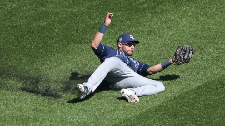 TORONTO, ON - SEPTEMBER 23: Kevin Kiermaier #39 of the Tampa Bay Rays makes a sliding catch in the third inning during MLB game action against the Toronto Blue Jays at Rogers Centre on September 23, 2018 in Toronto, Canada. (Photo by Tom Szczerbowski/Getty Images)