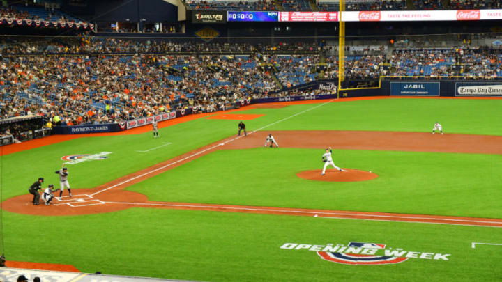 ST PETERSBURG, FLORIDA - MARCH 28: Blake Snell #4 of the Tampa Bay Rays throws the first pitch of the season to George Springer #4 of the Houston Astros During Opening Day at Tropicana Field on March 28, 2019 in St Petersburg, Florida. (Photo by Julio Aguilar/Getty Images)