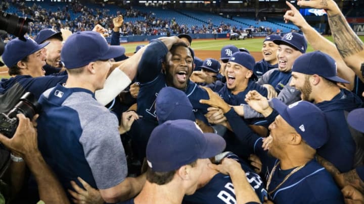 TORONTO, ONTARIO - SEPTEMBER 27: Tampa Bay Rays players celebrate clinching a wild card playoff spot after defeating the Toronto Blue Jays in their MLB game at the Rogers Centre on September 27, 2019 in Toronto, Canada. (Photo by Mark Blinch/Getty Images)