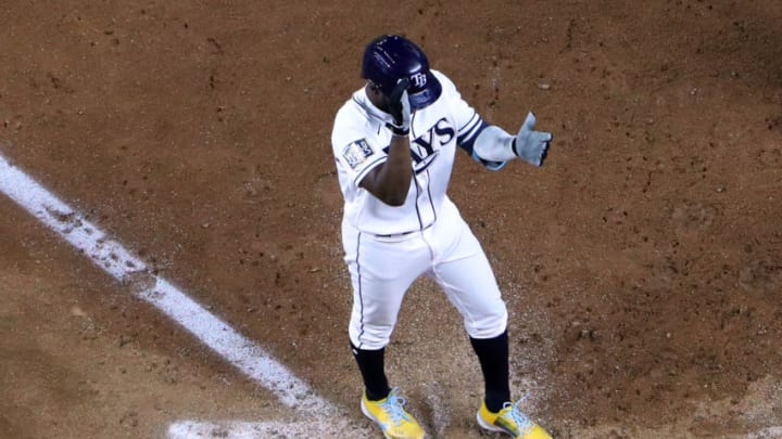 ARLINGTON, TEXAS - OCTOBER 23: Randy Arozarena #56 of the Tampa Bay Rays celebrates after hitting a solo home run against the Los Angeles Dodgers during the ninth inning in Game Three of the 2020 MLB World Series at Globe Life Field on October 23, 2020 in Arlington, Texas. (Photo by Sean M. Haffey/Getty Images)