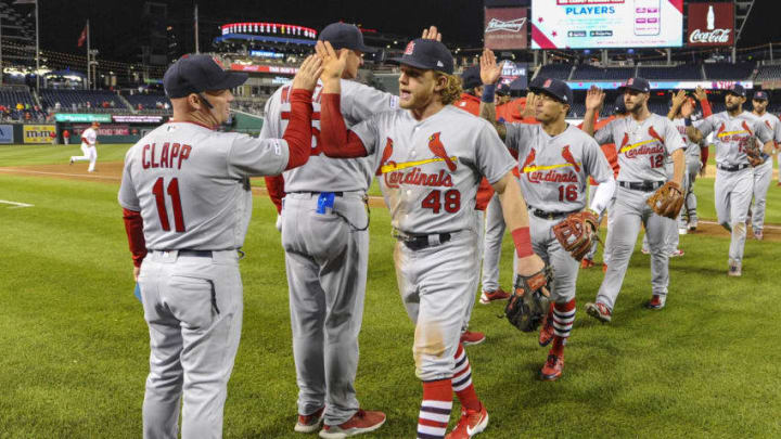 WASHINGTON, DC - APRIL 29: St. Louis Cardinals center fielder Harrison Bader (48) is congratulated by first base coach Stubby Clapp (11) following the game between the St. Louis Cardinals and the Washington Nationals on April 29, 2019, at Nationals Park, in Washington D.C. (Photo by Mark Goldman/Icon Sportswire via Getty Images)