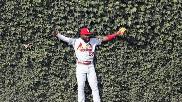 CHICAGO, ILLINOIS - SEPTEMBER 20: Marcell Ozuna #23 of the St. Louis Cardinals reacts after catching the fly out by Kris Bryant #17 of the Chicago Cubs during the seventh inning of a game at Wrigley Field on September 20, 2019 in Chicago, Illinois. (Photo by Nuccio DiNuzzo/Getty Images)