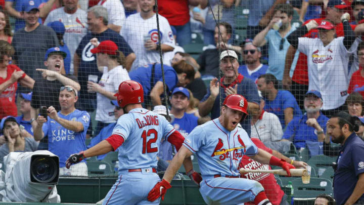 CHICAGO, ILLINOIS - SEPTEMBER 21: Paul DeJong #12 of the St. Louis Cardinals is congratulated by Harrison Bader #48 following his home run during the ninth inning of a game against the Chicago Cubs at Wrigley Field on September 21, 2019 in Chicago, Illinois. (Photo by Nuccio DiNuzzo/Getty Images)