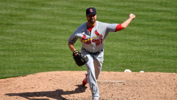 CINCINNATI, OH - APRIL 4: Andrew Miller #21 of the St. Louis Cardinals pitches against the Cincinnati Reds at Great American Ball Park on April 4, 2021 in Cincinnati, Ohio. (Photo by Jamie Sabau/Getty Images)