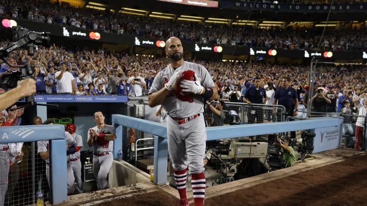 LOS ANGELES, CALIFORNIA – SEPTEMBER 23: Albert Pujols #5 of the St. Louis Cardinals acknowledges the crowd after hitting his 700th career home run at Dodger Stadium on September 23, 2022 in Los Angeles, California. (Photo by Ashley Landis – Pool/Getty Images)