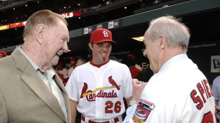 ST. LOUIS - APRIL 3: St. Louis Cardinals utility player Scott Spiezio #26 and his father Ed talk with Hall of Famer Red Shoendienst before the game against the New York Mets at Busch Stadium on April 3, 2007 in St. Louis, Missouri. (Photo by Scott Rovak/Getty Images)